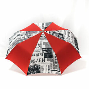 Parapluie pliant imprimé journal rouge